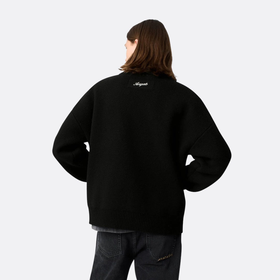 <PRODUCTTITLE> in Black by Axel Arigato.