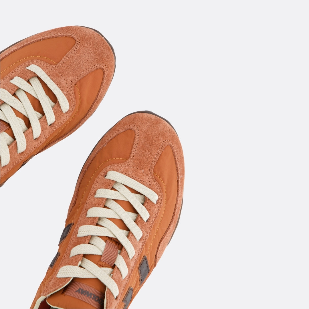 <PRODUCTTITLE> in Orange by Coolway.