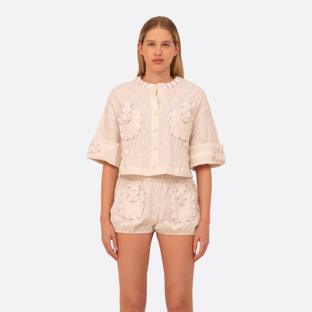 <PRODUCTTITLE> in White by Carmen Says.