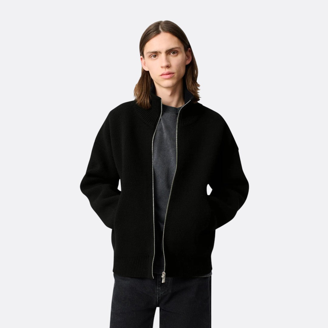 <PRODUCTTITLE> in Black by Axel Arigato.